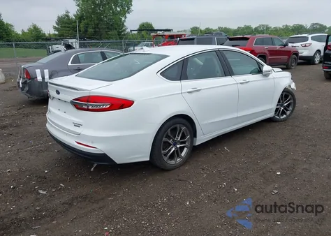 2020 Ford Fusion Hybrid Titanium z USA, uszkodzony, nr VIN 3FA6P0RUXLR139574